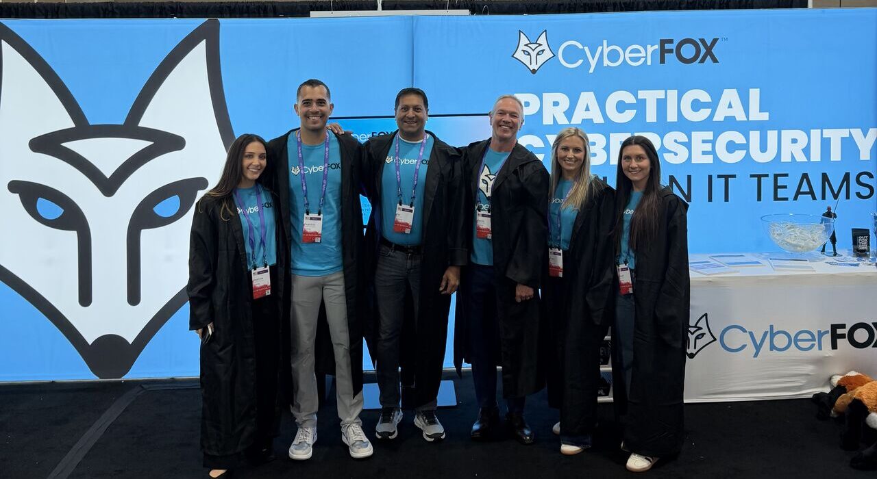 CyberFOX professionals and IT security certified experts with CEO David Belline at a recent industry event booth in 2026