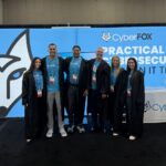 CyberFOX professionals and IT security certified experts with CEO David Belline at a recent industry event booth in 2026