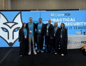 CyberFOX professionals and IT security certified experts with CEO David Belline at a recent industry event booth in 2026